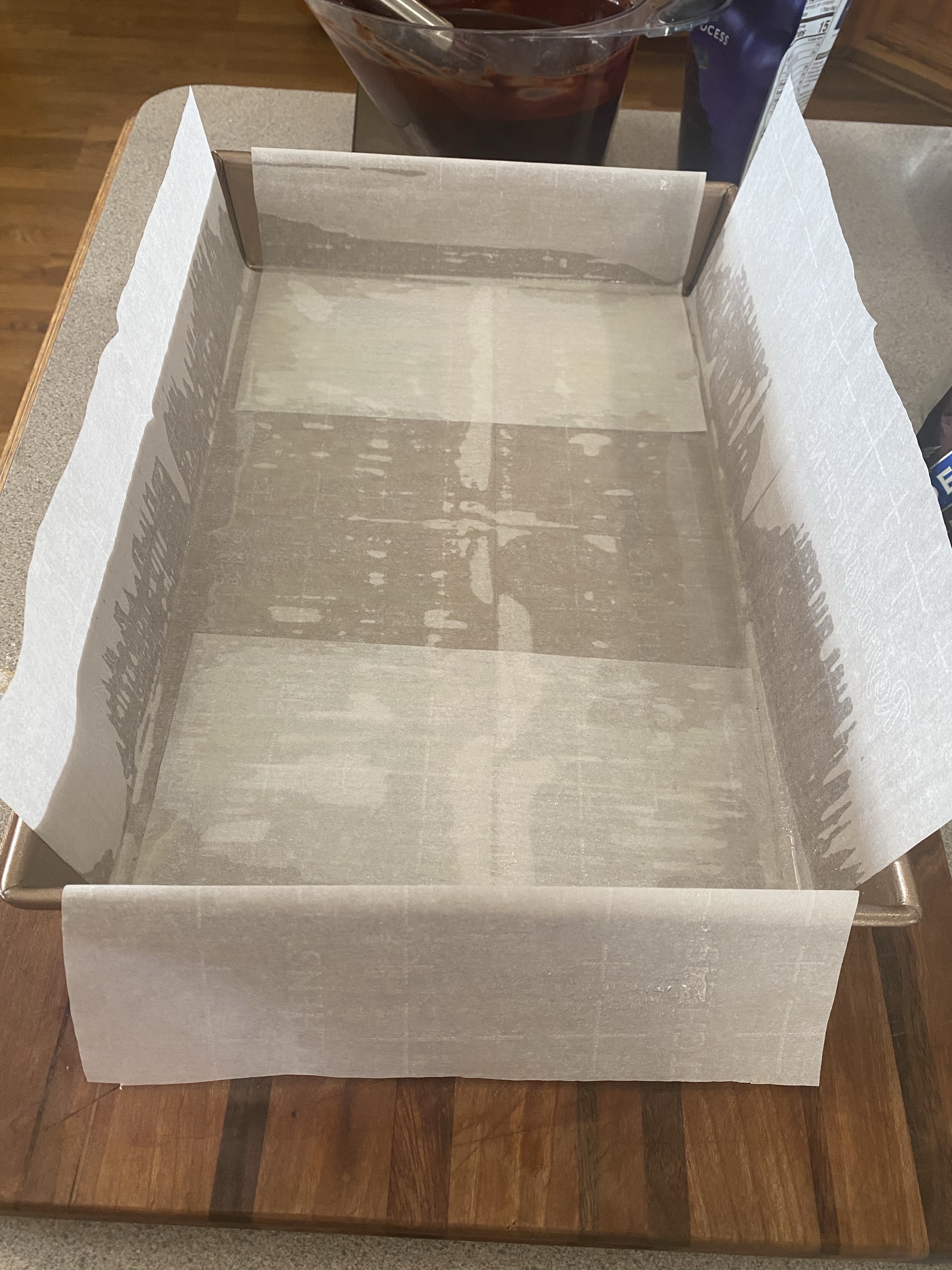 parchment paper prepped baking pan