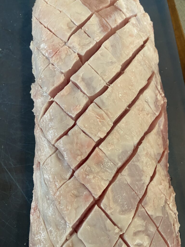 trimmed and scored pork loin